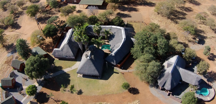 Experience the Bushveld
Wild Wildebeest Lodge is located approximately three hours from Johannesburg International Airport.  It is northwest of Thabazimbi in the Limpopo Province of South Africa (malaria-free) and near the Botswana border.
Contact Info
U.S. Office:  Mike and Karen Helbing
                    11481 - 140th Street
                    Powersville, MO  64672
Phone: (608)572-2388
Email: helbing@wwbeest.com
Visit and Like us on Facebook.
